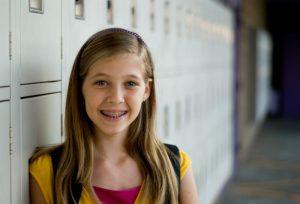 young girl with braces