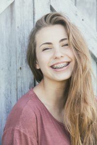 young girl with braces