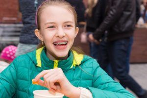 happy child with braces 