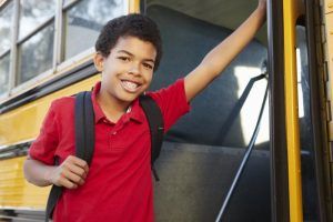 smiling child with braces 