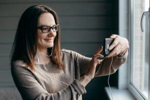 woman having a virtual consult at home 