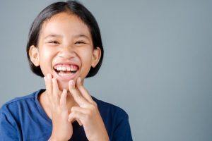 young woman with gummy smile 