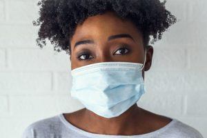 young woman wearing a facemask 